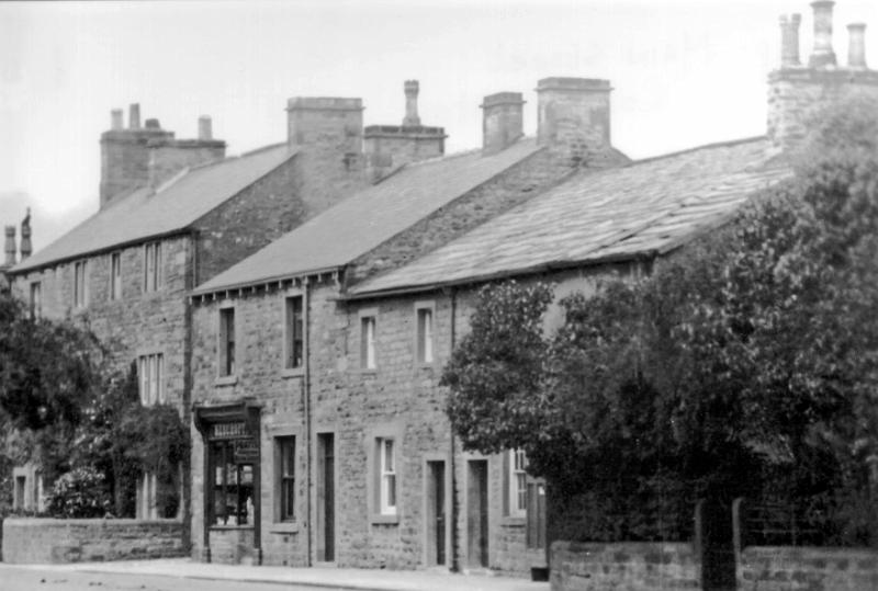 Beecrofts shop c1916.JPG - Main Street showing Beecroft's Shop - Later John Shepherd's Shop. (The three story house on the left is Grosvenor Place)